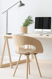 Image of a single chair office setup with a monitor on table